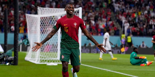 Portugal's Rafael Leao celebrates scoring his team's third goal against Ghana during the FIFA World Cup Group H soccer match at Stadium 974 in Doha, Qatar, Thursday, Nov. 24, 2022. 