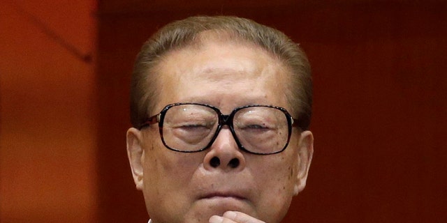 FILE - Former Chinese President Jiang Zemin watches the proceedings at the opening session of the 18th Communist Party Congress held at the Great Hall of the People in Beijing, Nov. 8, 2012. Jiang has died Wednesday, Nov. 30, 2022, at age 96.