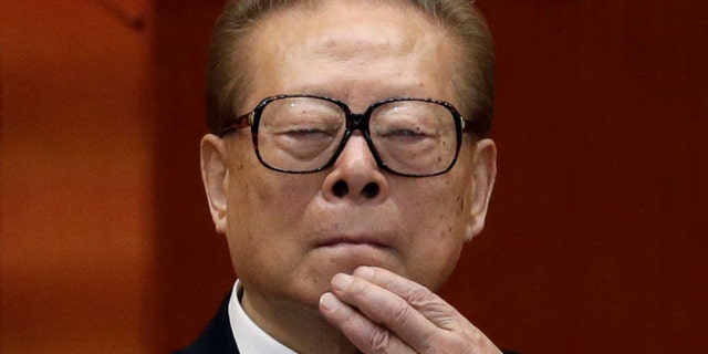 FILE - Former Chinese President Jiang Zemin watches the proceedings at the opening session of the 18th Communist Party Congress held at the Great Hall of the People in Beijing, Nov. 8, 2012. Jiang has died Wednesday, Nov. 30, 2022, at age 96.