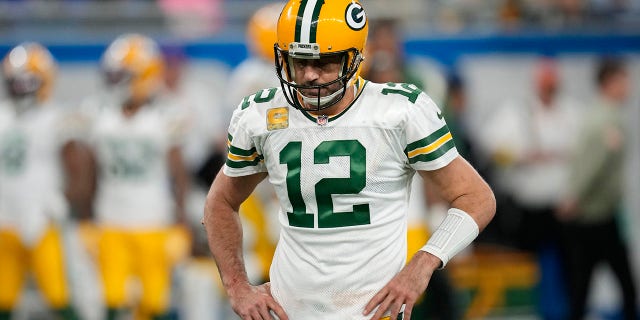 Green Bay Packers quarterback Aaron Rodgers walks to the sideline during the second half of a game against the Detroit Lions Nov. 6, 2022, in Detroit.