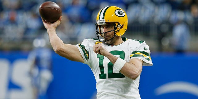 Green Bay Packers quarterback Aaron Rodgers throws during pregame against the Detroit Lions, Nov. 6, 2022, in Detroit.