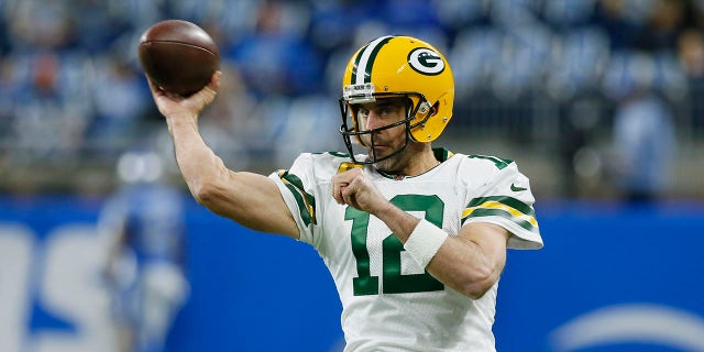 Green Bay Packers quarterback Aaron Rodgers throws during pregame against the Detroit Lions, Nov. 6, 2022, in Detroit.