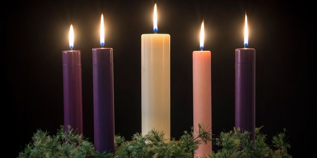 All five candles lit on an advent wreath