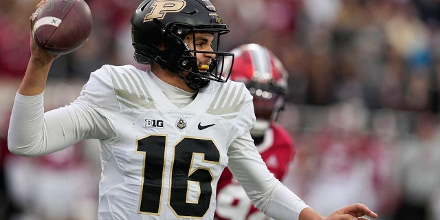 Purdue quarterback Aidan O'Connell, #16, throws during the first half of an NCAA college football game against Indiana, Saturday, Nov. 26, 2022, in Bloomington, Indiana.