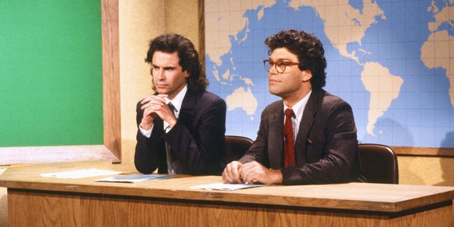 Dennis Miller, left, and Al Franken during the "Saturday Night Live" skit "Weekend Update" on Oct. 17, 1987.