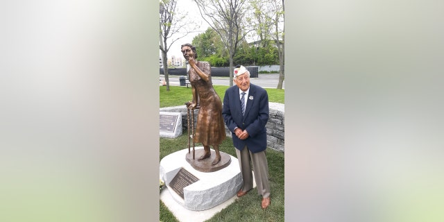 "Chick" Galella, World War II veteran, is shown in 2021 standing beside the Gold Star Mothers memorial — which he arranged in honor of his fallen best friend's mother and all Gold Star Mothers. 