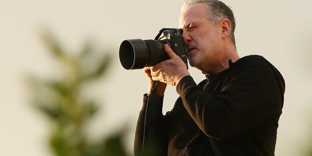 Photo artist Spencer Tunick photographs members of the public at Bondi Beach on November 26, 2022 in Sydney, Australia.