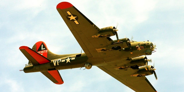 The historic military B-17 aircraft named "Texas Raiders" flies over Barksdale A.F.B., La., on May 8, 2021. On Saturday, the plane collided with another during the Commemorative Air Force Wings Over Dallas air show.