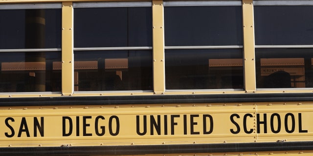 San Diego Unified School District signage is seen on a Navistar International Corp. school bus at the San Diego Unified School District Transportation Department in San Diego, California, U.S., on Thursday, July 9, 2020. 