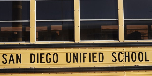 San Diego Unified School District signage is seen on a Navistar International Corp. school bus in San Diego, California, on July 9, 2020.