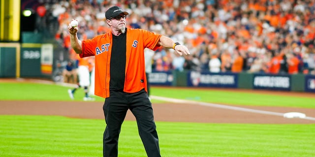 Former Houston Astros player Jeff Bagwell throws out the ceremonial first pitch before Game 2 of the World Series against the Atlanta Braves at Minute Maid Park on Oct. 27, 2021, in Houston.