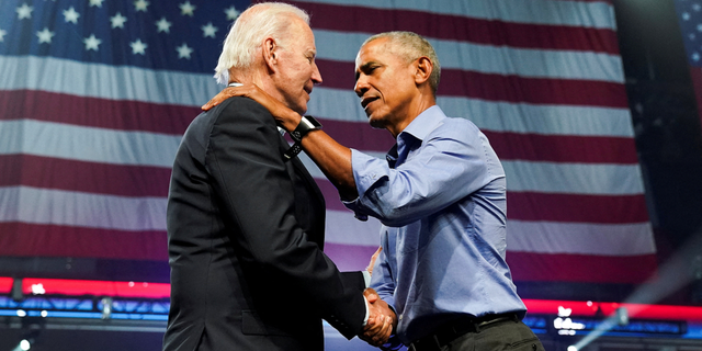 U.S. President Joe Biden and former President Barack Obama attend a campaign event for Democratic U.S. senatorial candidate John Fetterman and Democratic nominee for Pennsylvania governor Josh Shapiro in Philadelphia, Pennsylvania, on Nov. 5.