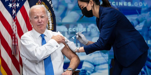 President Biden receives a COVID-19 Vaccine booster shot inside the South Court Auditorium at the White House in Washington on Tuesday, Oct. 25, 2022.