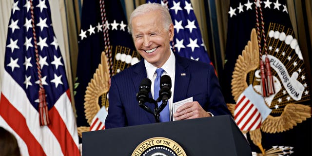 President Biden smiles during a news conference in the State Dining Room of the White House in Washington, D.C., Wednesday, Nov. 9, 2022. Biden spoke following a midterm election in which Democrats fared better than expected. 