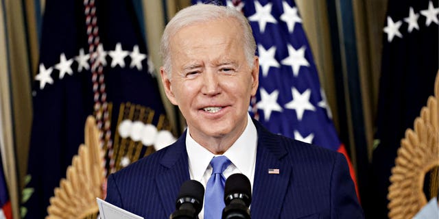 US President Joe Biden smiles during a news conference in the State Dining Room of the White House in Washington, DC, US, on Wednesday, Nov. 9, 2022. Biden is speaking following a midterm election in which Democrats fared better than expected and avoided a worst-case scenario in Tuesday night's vote as a feared Republican wave failed to materialize. 