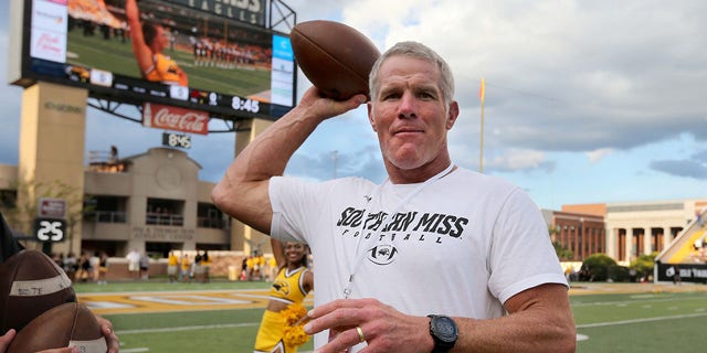 September 8, 2018;  Hattiesburg, MS, USA;  Hall of Fame quarterback Brett Favre warms up before the game between the Southern Miss Golden Eagles and Louisiana Monroe Warhawks at MM Roberts Stadium.  Favre played for Southern Miss.