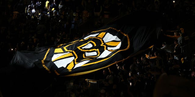 A flag with the Boston Bruins logo is moved by fans before Game Three of the First Round of the 2022 Stanley Cup Playoffs at TD Garden on May 06, 2022 in Boston, Massachusetts.