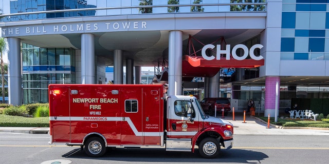A Newport Beach Fire ambulance makes its way to the entrance at Children's Health of Orange County, California, on Nov. 1, 2022.