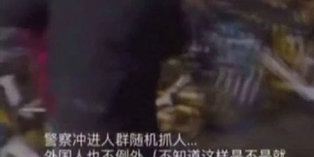 Video Shows Chinese Officers Arresting BBC Reporter As China Defends ...