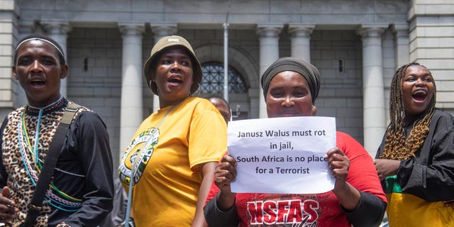 The ANCYL, SACP, MKMVA, and ANC members protested outside the Cape Town High Court on Nov. 24, 2022 in Cape Town, South Africa. This comes after the constitutional court ordered the release on parole of Janusz Walus, the man convicted of assassinating anti-apartheid leader Chris Hani in 1993. 