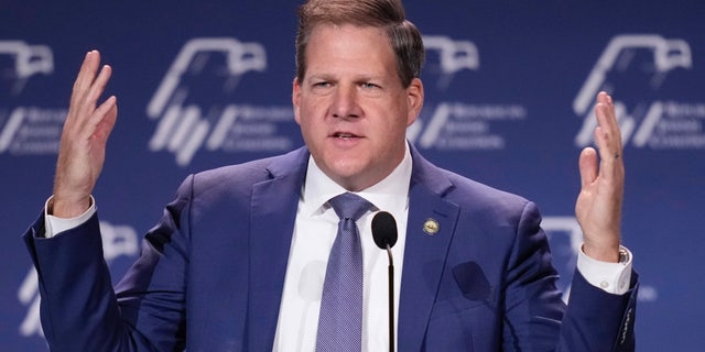 New Hampshire Gov. Chris Sununu speaks at an annual leadership meeting of the Republican Jewish Coalition Saturday, Nov. 19, 2022, in Las Vegas. 