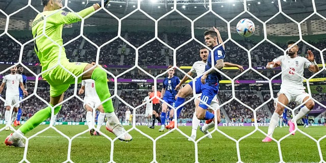 Christian Pulisic scores during the World Cup group B match against Iran at the Al Thumama Stadium in Doha, Qatar, Tuesday, November 29, 2022.