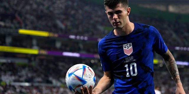 Christian Pulisic of the United States carries a ball during the World Cup Group B soccer match between Iran and the United States at the Al Thumama Stadium in Doha, Qatar, Tuesday, November 29, 2022.