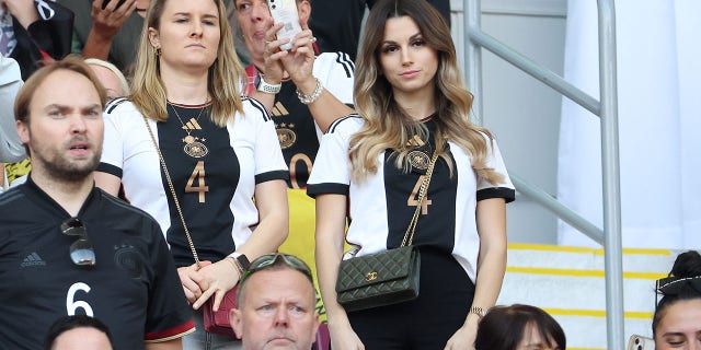 Christina Raphaella, right, wife of Matthias Ginter of Germany, attends a FIFA World Cup Qatar 2022 Group E match between Germany and Japan at Khalifa International Stadium Nov. 23, 2022, in Doha, Qatar.