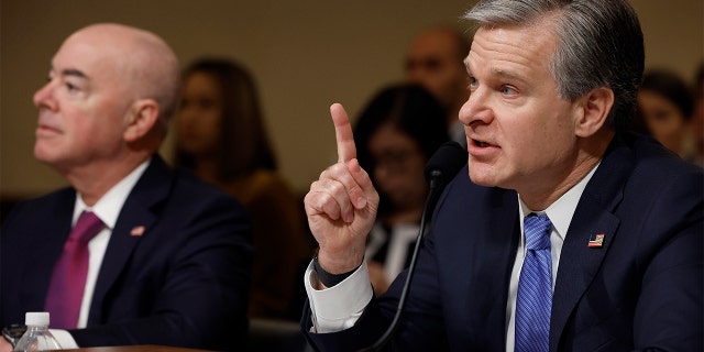 FBI Director Christopher Wray testifies with Homeland Security Secretary Alejandro Mayorkas before the House Homeland Security Committee in the Cannon House Office Building on Capitol Hill on Nov. 15, 2022, in Washington, DC