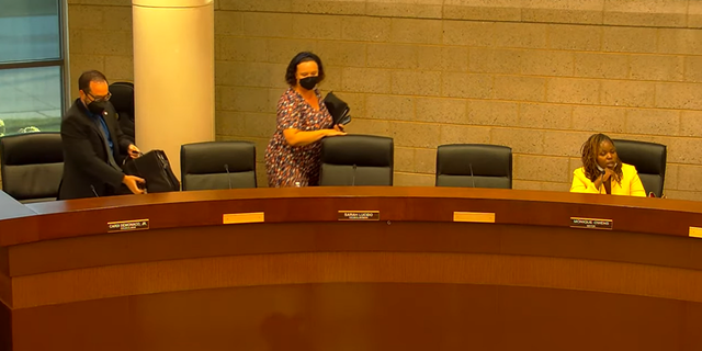 Members of the Eastpointe City Council leaving a meeting on September 6, 2022.