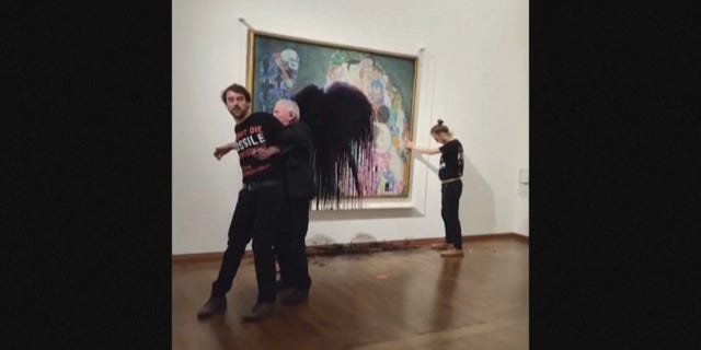 Climate activists dumped black rain on Gustav Klimt "Death and Life" The painting is displayed in the Vienna museum Tuesday. "People still searching for and drilling for new oil and gas have blood on their hands - and no amount of funding will ever wash that blood away," the opposition group said. "There can be no clean technology with dirty money involved!"