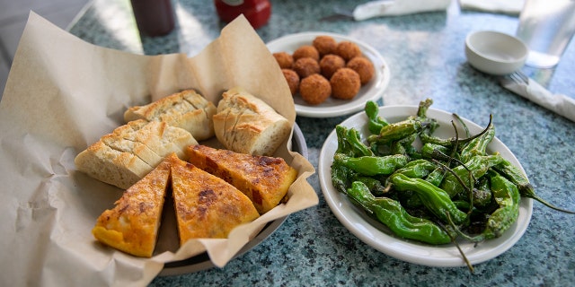 Croquetas, Tortilla de Patatas and grilled peppers at Bar Gernika in Boise, Idaho.