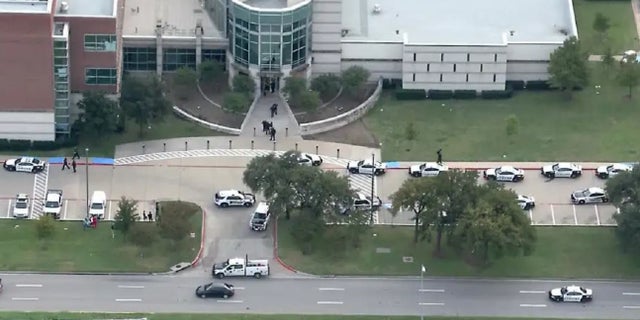 Authorities responded to the Dallas County Medical Examiner's Office Tuesday amid reports of active shootings in which two people, including the suspect, were killed, officials said.