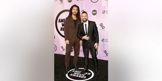 Dan + Shay earned favorite country group trophy after walking red carpet at American Music Awards.