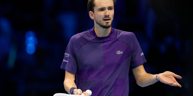 Daniil Medvedev reacts after losing a point against Andrey Rublev during the ATP World Tour Finals in Turin, Italy, Monday, Nov. 14, 2022.