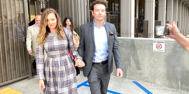 Danny Masterson and Bijou Phillips exiting the LA court