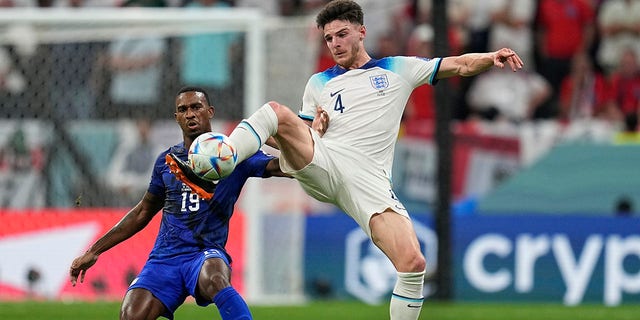 England's Declan Rice kicks the ball during the World Cup match against the United States, in Al Khor, Qatar, Friday, Nov. 25, 2022.