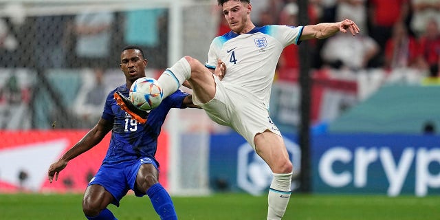 England's Declan Rice kicks the ball during the World Cup match against the United States, in Al Khor, Qatar, Friday, Nov. 25, 2022.