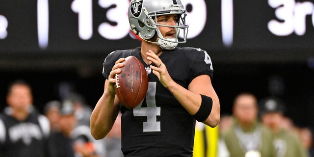 Las Vegas Raiders quarterback Derek Carr throws the ball against the Indianapolis Colts in the first half of a game in Las Vegas, Sunday, November.  13, 2022. 
