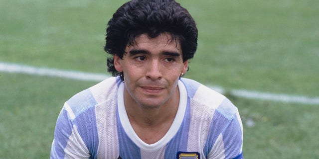 FILE – Argentina captain Diego Maradona in action against Bulgaria in the FIFA 1986 World Cup group match at the Olympic Stadium in Mexico City, Mexico, June 10, 1986.