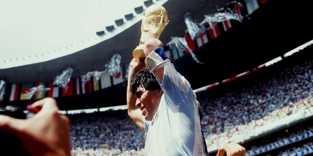 Diego Maradona celebrates Argentina's win in 1986.