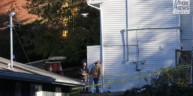 Investigators fly a drone over the home in Moscow, Idaho on Friday, November 18, 2022, where a quadruple murder took place last weekend.