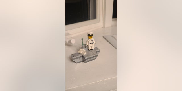 Dylan Smith of New York created this LEGO piece to honor his own dad — who served in the U.S. Navy for 21 years.