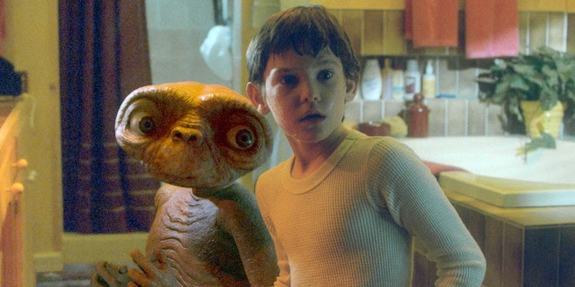 Henry Thomas on the set of "E.T."