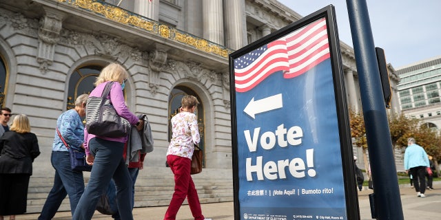 A voting sign is seen outside the San Francisco City Hall as early voting continues for "Consolidated General Election" on Oct. 28, 2022.