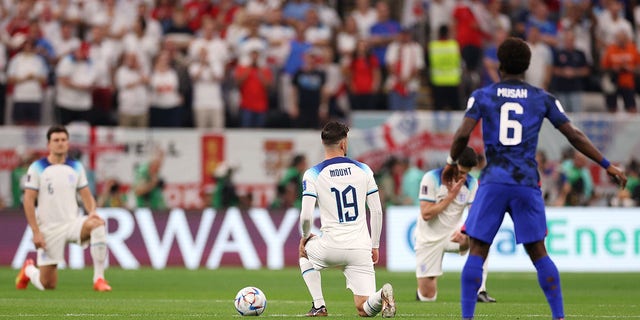 Mason Mount of England takes a knee prior to kickoff during a FIFA World Cup Qatar 2022 Group B match between England and USA at Al Bayt Stadium Nov. 25, 2022, in Al Khor, Qatar.