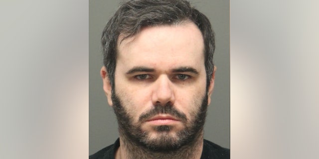 Eric Kyle Belk, 37, a teacher at Sanderson High School in Raleigh, was arrested Tuesday and charged with 10 counts of second-degree sexual exploitation of a minor.