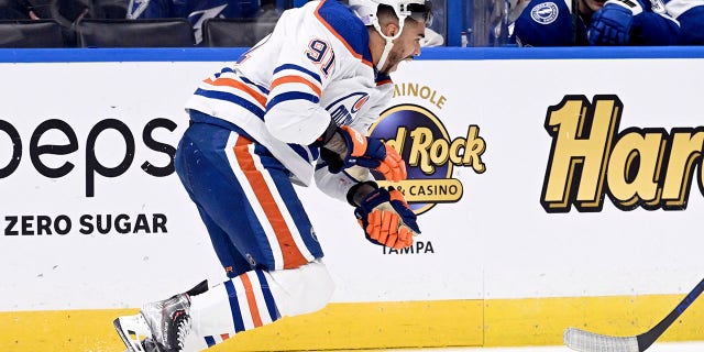 Edmonton Oilers left wing Evander Kane heads to the bench after being cut during the Lightning game Tuesday, Nov. 8, 2022, in Tampa.