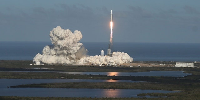 CAPE CANAVERAL, FL - FEBRUARY 06: The SpaceX Falcon Heavy rocket lifts off from launch pad 39A at Kennedy Space Center on February 6, 2018, in Cape Canaveral, Florida.