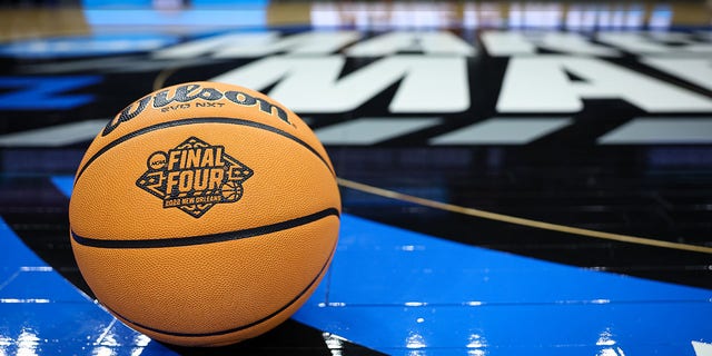 A general view of a basketball with the Final Four logo on the court before the Elite Eight round of the 2022 NCAA Men's Basketball Tournament game between the North Carolina Tar Heels and the St. Peter's Peacocks held at Wells Fargo Center on March 27, 2022 in Philadelphia, Pennsylvania.